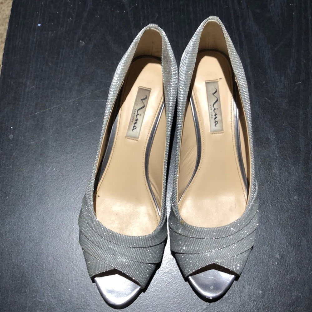 Nina silver sparkle dress shoes with kitten wedge low heel.  Size 8.5